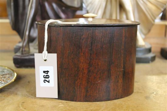 Regency rosewood oval tea caddy, the hinged cover with ivory finial